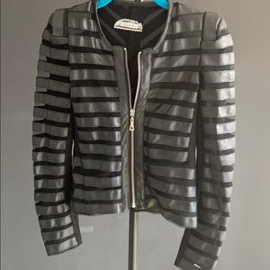 A black  and white leather jacket